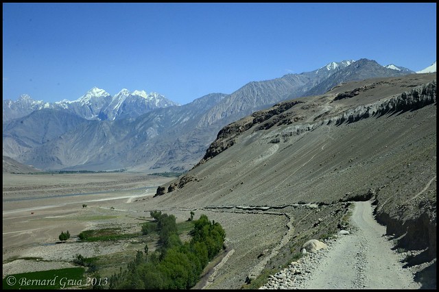 The only road of Afghan Wakhan, Panj River, Hindu Kush summits, Afghanistan  Bernard Grua